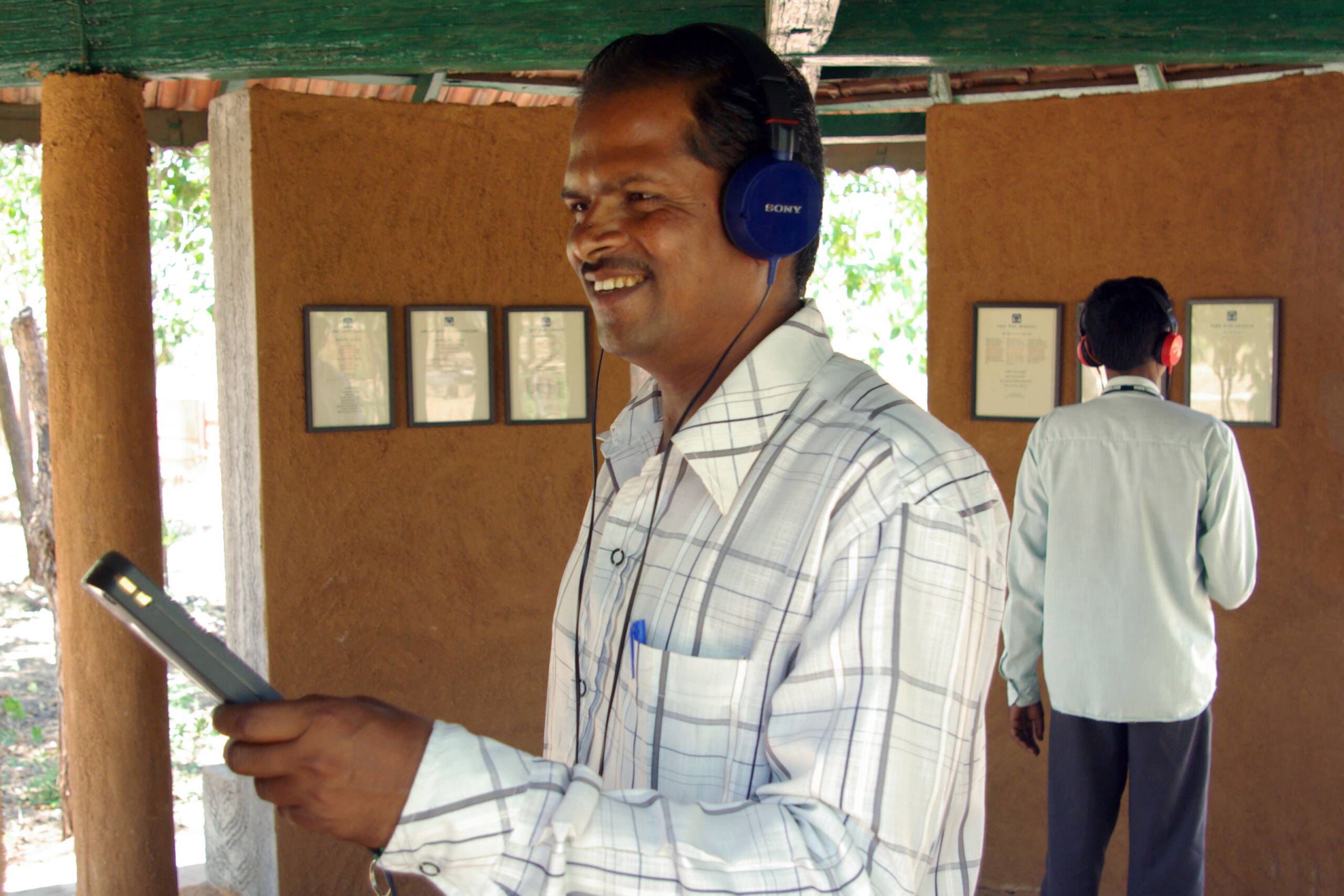 Visitors using audio guides available in English, Hindi and Gujarati languages